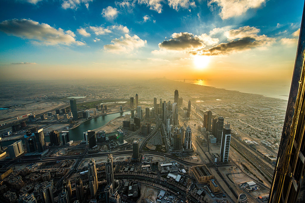 By Simon Bierwald from Dortmund, Germany (Dubai Sunset from Burj Khalifa) [CC BY-SA 2.0 (https://creativecommons.org/licenses/by-sa/2.0)], via Wikimedia Commons